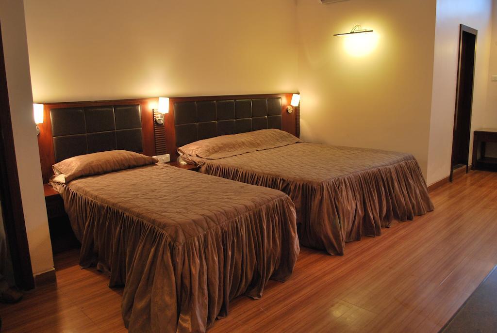Hotel Millennium Gauháti Szoba fotó